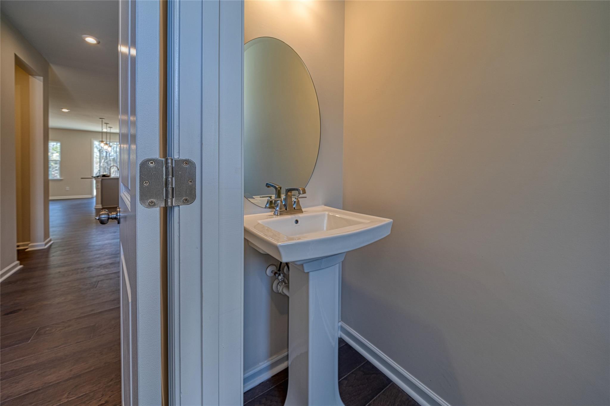 513 Madison Falls Court Fort Mill, SC 29708 - Photo 32 of 37 a bathroom with a sink and a mirror