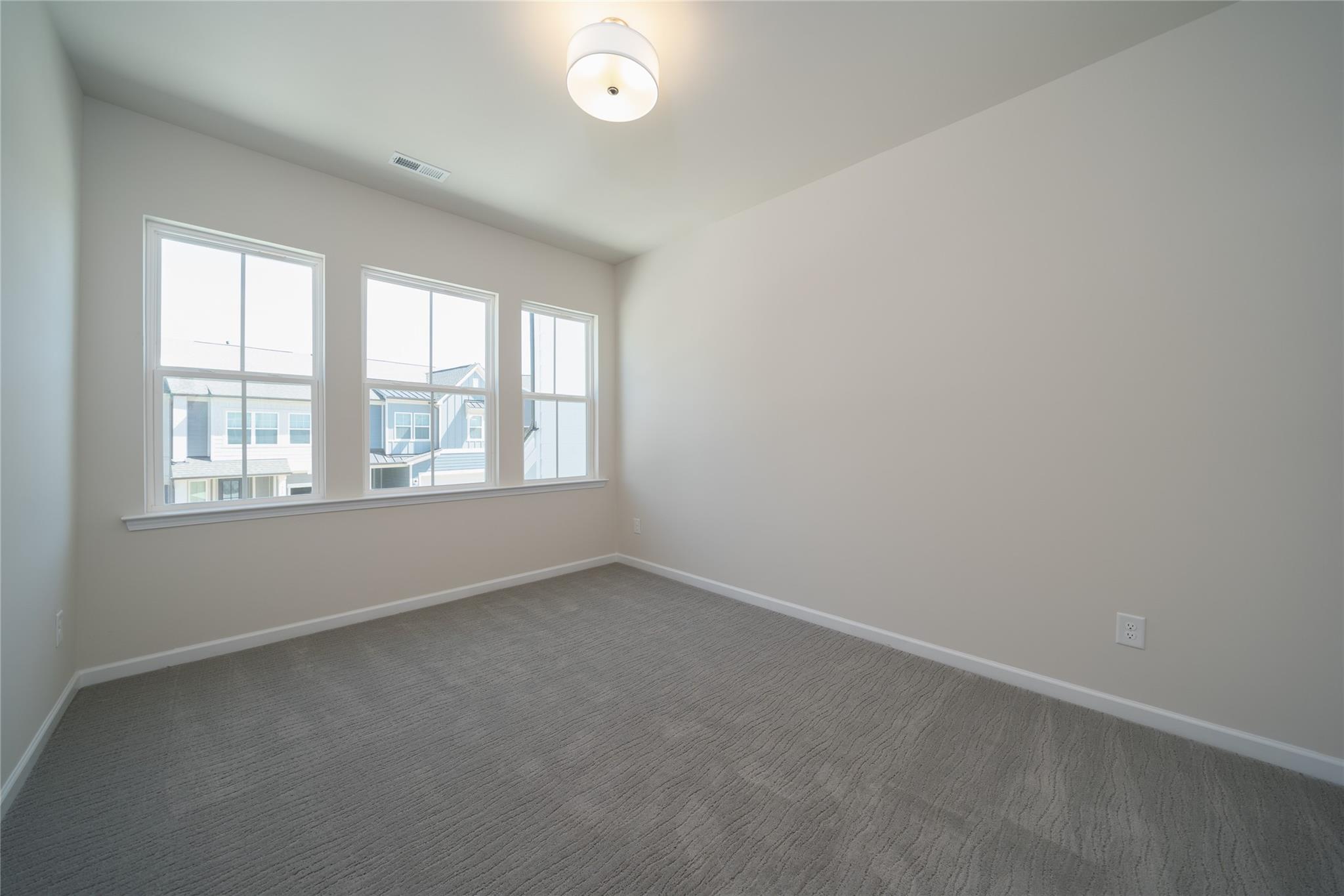 513 Madison Falls Court Fort Mill, SC 29708 - Photo 7 of 37 an empty room with windows