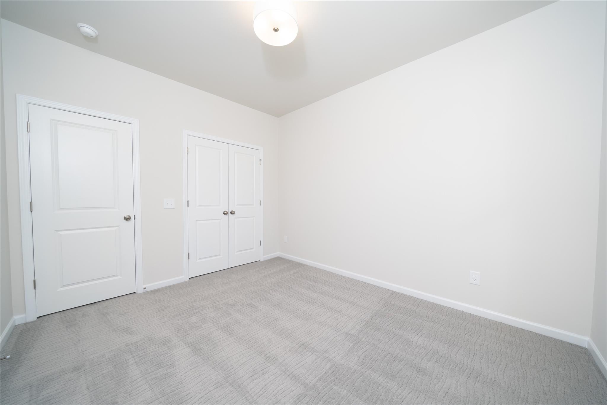513 Madison Falls Court Fort Mill, SC 29708 - Photo 9 of 37 an empty room with white wall