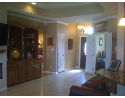 a view of livingroom with furniture and cabinet