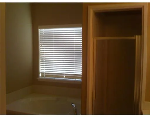 a view of a room that has a window in it