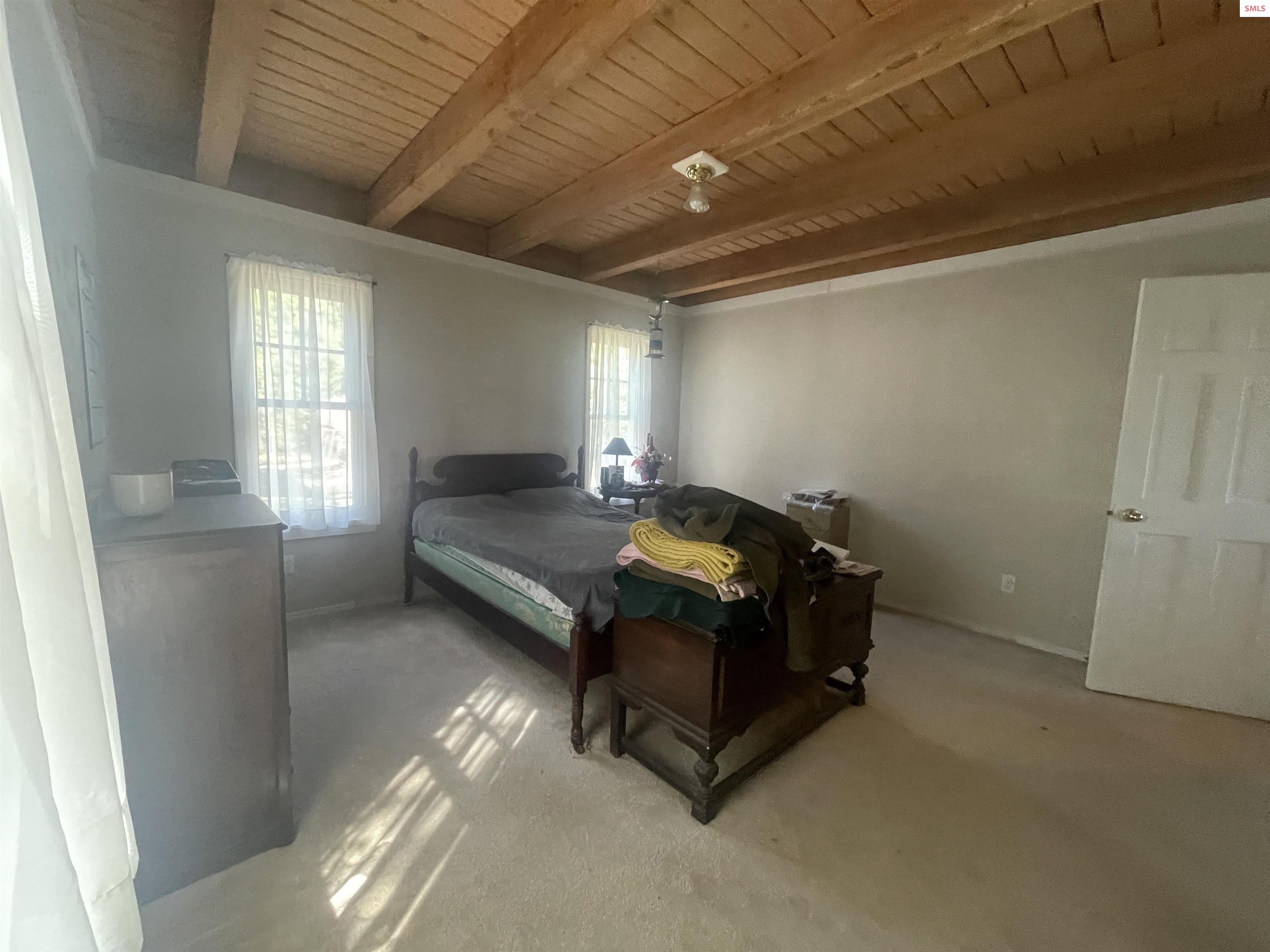 631 Wolverine Road Moyie Springs, ID 83845 - Photo 28 of 87 Large Main Floor Bedroom