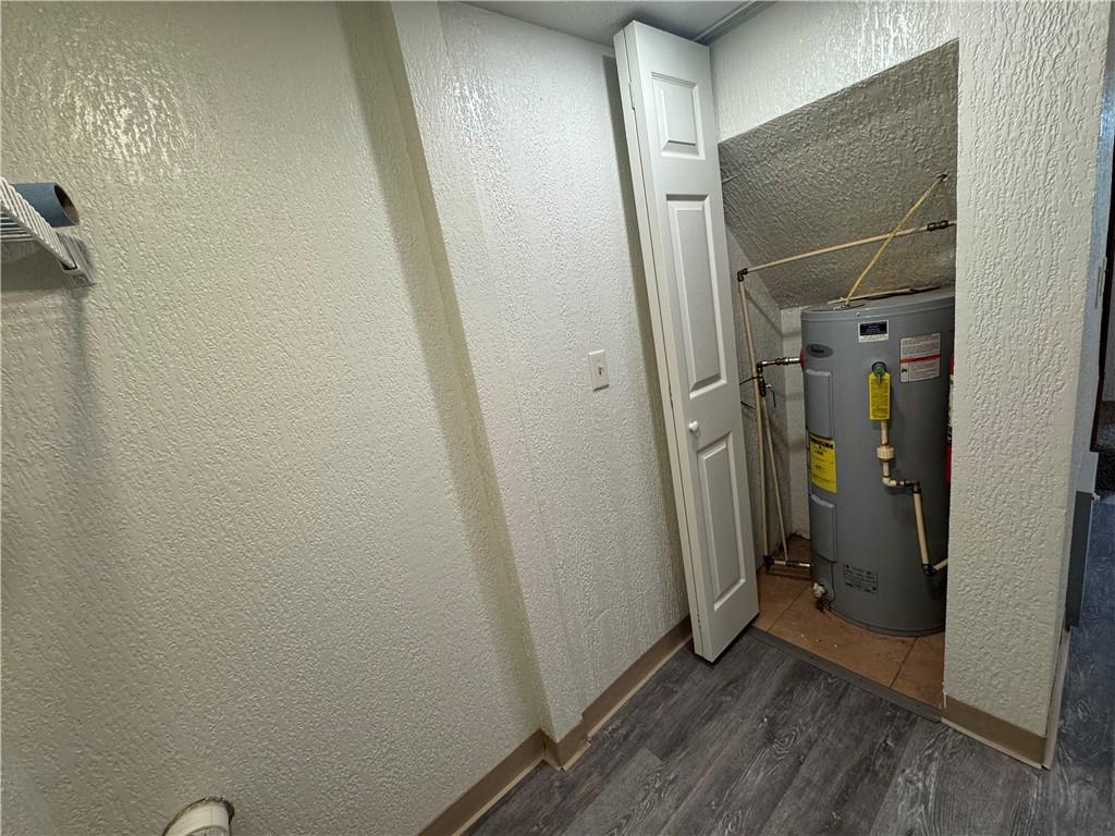 624 Main Street Merrittstown, PA 15463 - Photo 7 of 11 a view of a hallway with wooden floor and a hallway