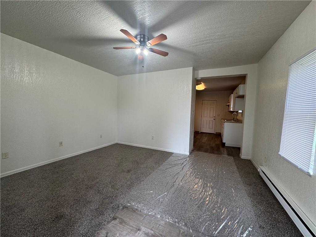 624 Main Street Merrittstown, PA 15463 - Photo 9 of 11 wooden floor in an empty room and a bathroom
