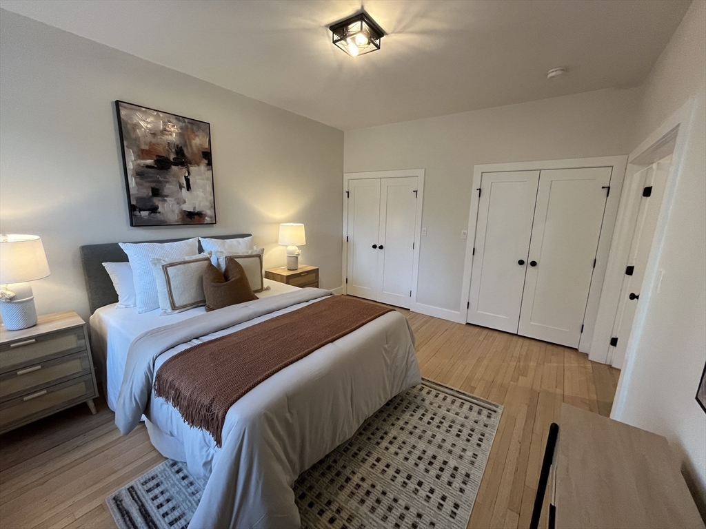 108 St Paul Street, Unit 2 Brookline, MA 02446 - Photo 10 of 15 a bedroom with bed and window