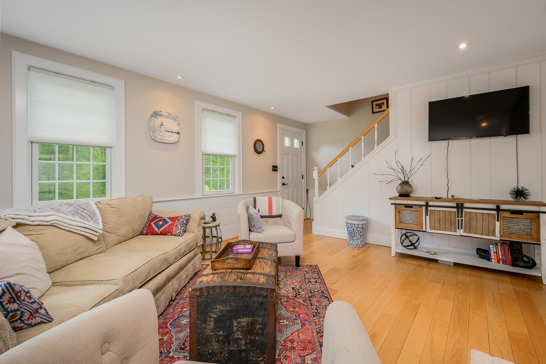 20 Squirrel Run Eastham, MA 02642 - Photo 8 of 37 a living room with furniture and a flat screen tv