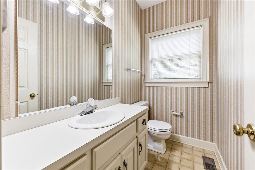 3608 Maple Forge Lane Gainesville, GA 30504 - Photo 18 of 45 a bathroom with a sink toilet and shower