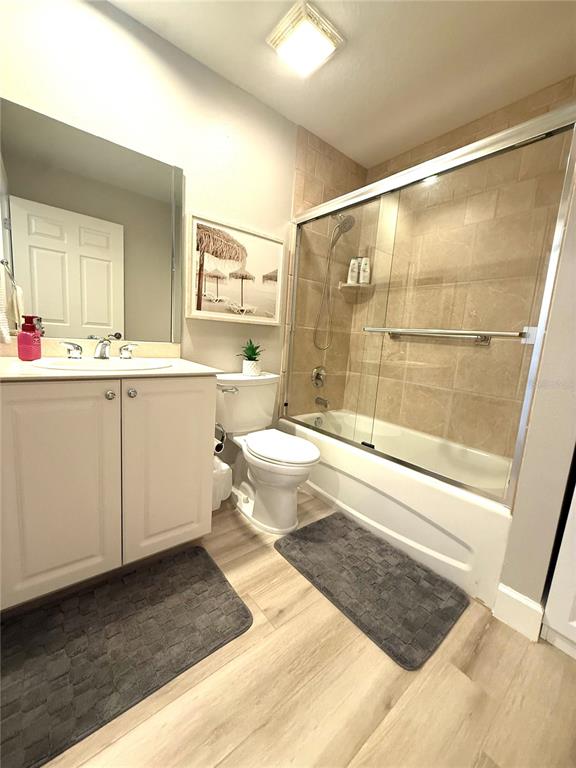 423 150th Avenue, Unit 1405 Madeira Beach, FL 33708 - Photo 15 of 23 a bathroom with a bathtub and a sink