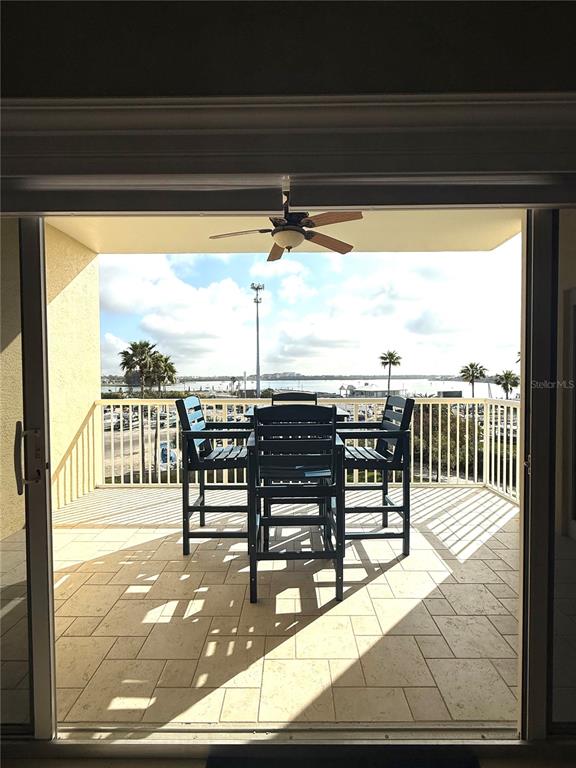 423 150th Avenue, Unit 1405 Madeira Beach, FL 33708 - Photo 18 of 23 a view of a balcony and chairs