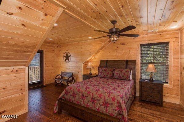 1857 Pinestand Rdg Way Pigeon Forge, TN 37862 - Photo 16 of 49 a bed room with a bed and a ceiling fan