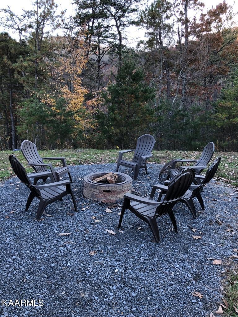 1857 Pinestand Rdg Way Pigeon Forge, TN 37862 - Photo 39 of 49 a view of a backyard with sitting area