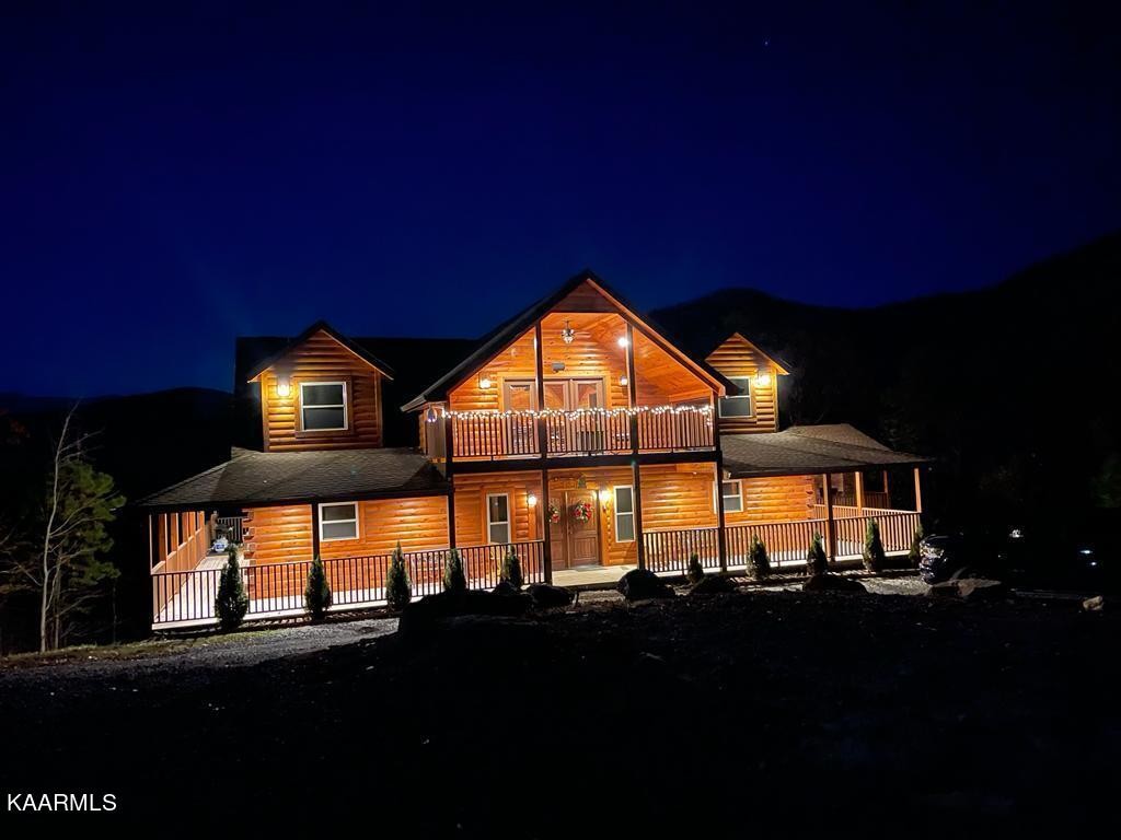 1857 Pinestand Rdg Way Pigeon Forge, TN 37862 - Photo 49 of 49 a view of house with an outdoor space and swimming pool