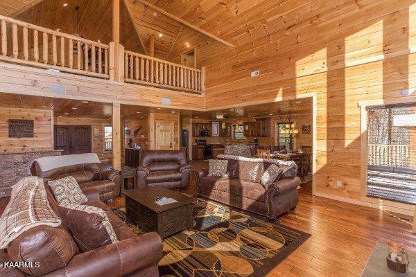 1857 Pinestand Rdg Way Pigeon Forge, TN 37862 - Photo 6 of 49 a view of a patio with couches table and chairs and wooden floor