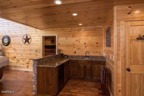 1857 Pinestand Rdg Way Pigeon Forge, TN 37862 - Photo 9 of 49 a kitchen with stainless steel appliances granite countertop a sink and cabinets