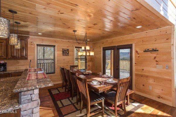 1857 Pinestand Rdg Way Pigeon Forge, TN 37862 - Photo 10 of 49 a view of a dining room with furniture and window