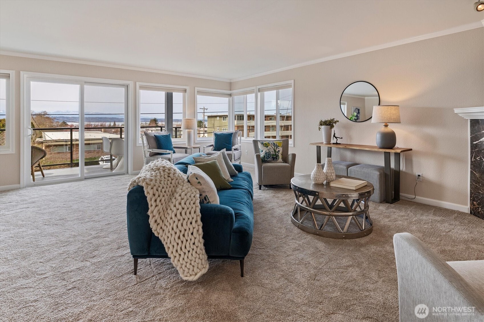 317 3rd Avenue South, Unit 201 Edmonds, WA 98020 - Photo 2 of 39 a living room with furniture and a large window