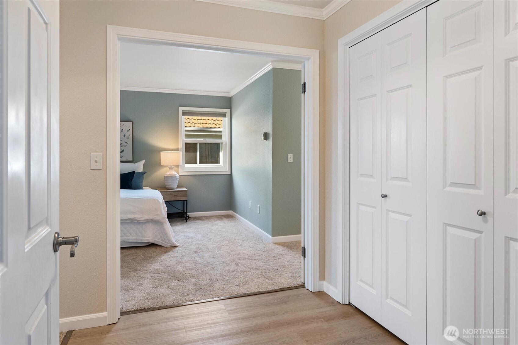 317 3rd Avenue South, Unit 201 Edmonds, WA 98020 - Photo 23 of 39 a view of a bedroom with furniture and a window