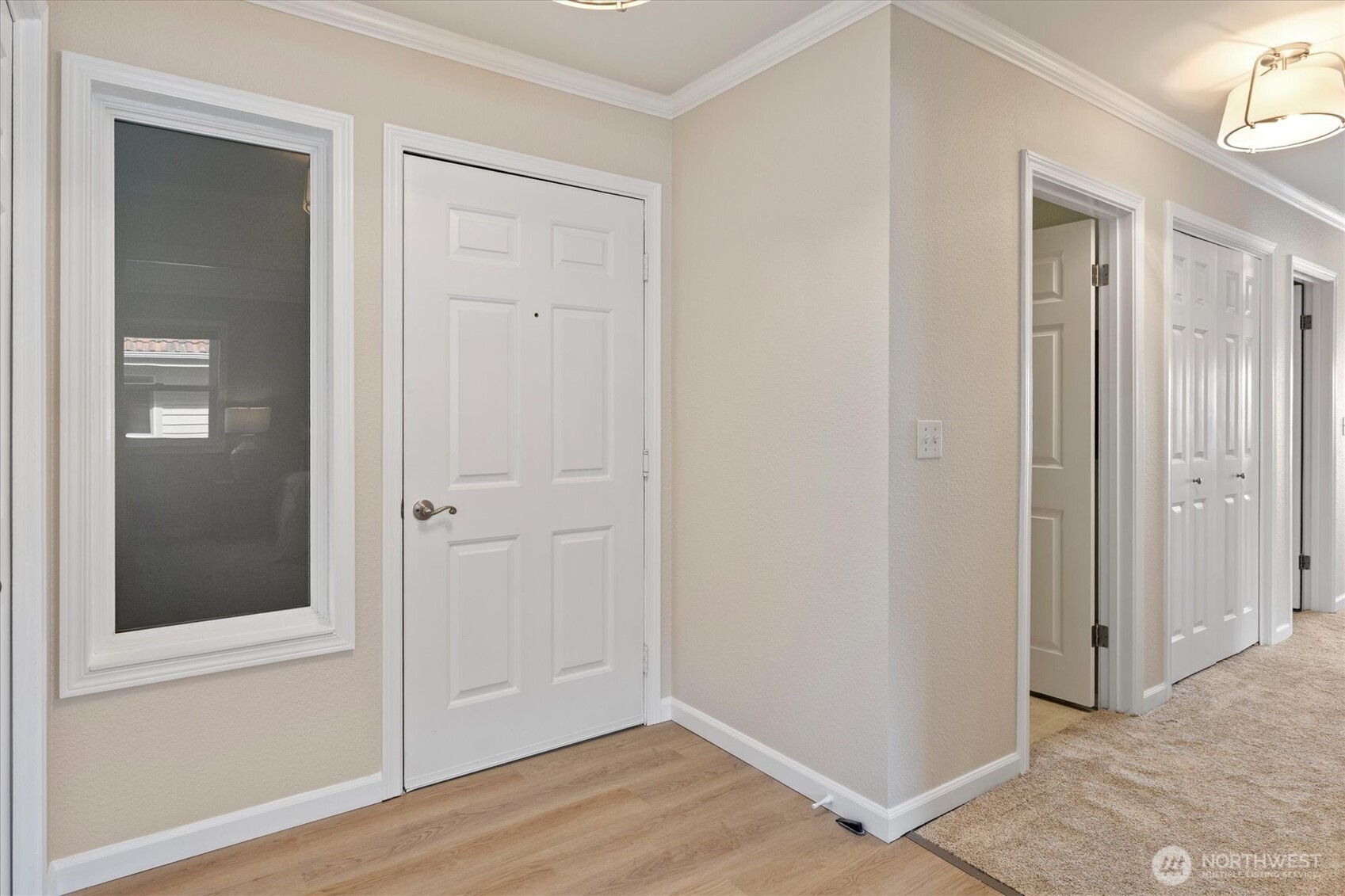 317 3rd Avenue South, Unit 201 Edmonds, WA 98020 - Photo 24 of 39 an empty room with wooden floor and closet area