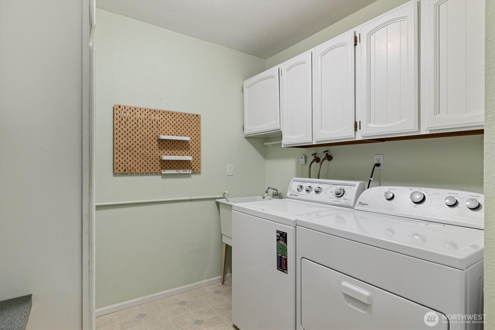 317 3rd Avenue South, Unit 201 Edmonds, WA 98020 - Photo 25 of 39 a utility room with dryer and washer
