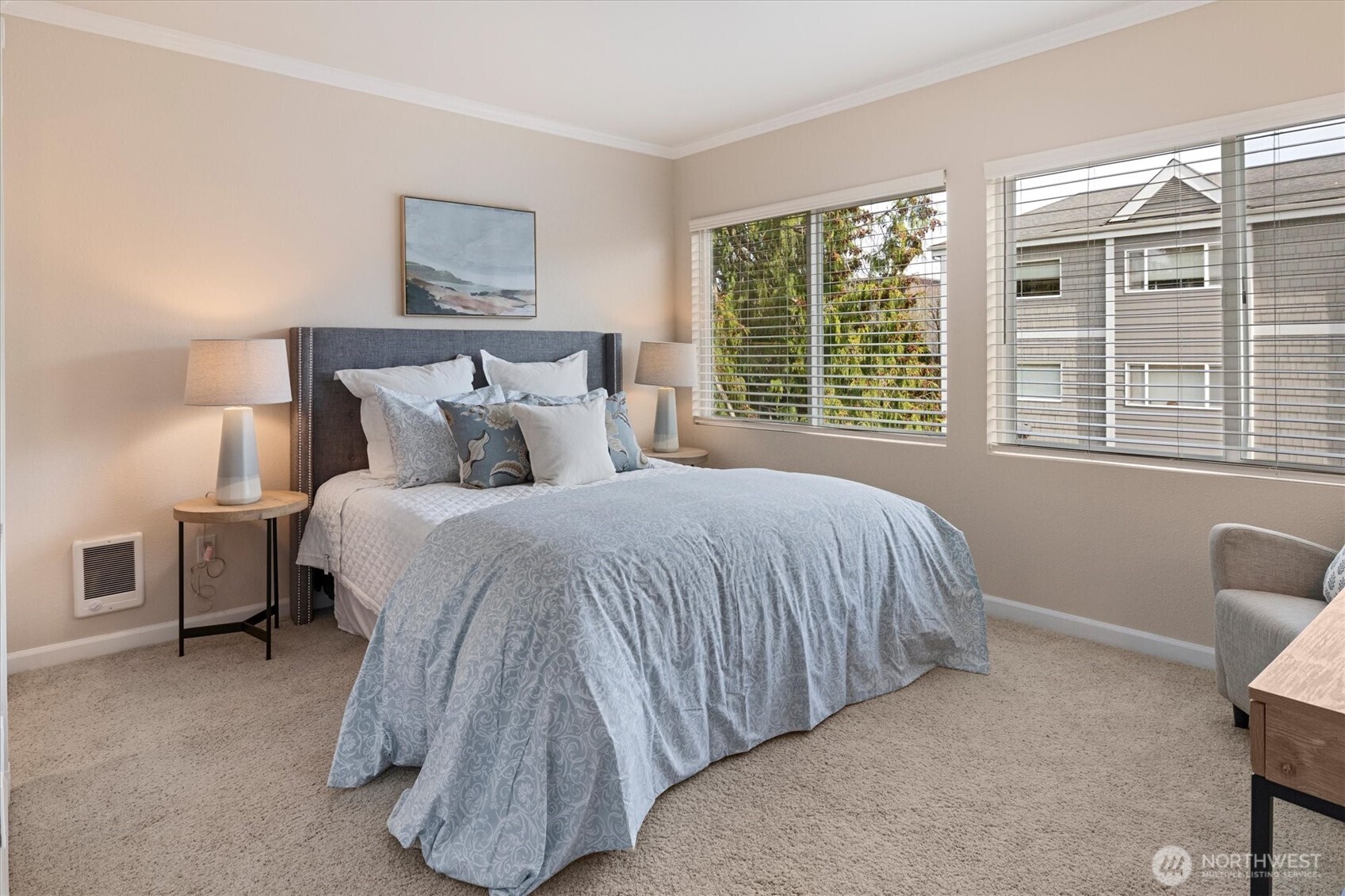 317 3rd Avenue South, Unit 201 Edmonds, WA 98020 - Photo 27 of 39 a bedroom with a bed and a window