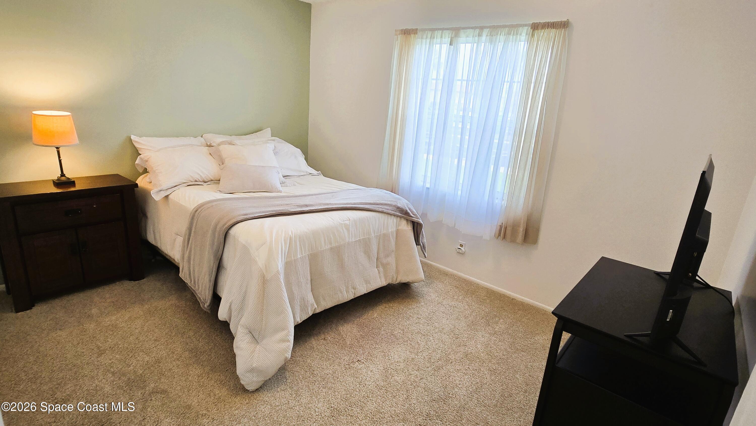 412 School Road, Unit 88 Indian Harbour Beach, FL 32937 - Photo 20 of 50 Guest Bedroom / Front of unit
