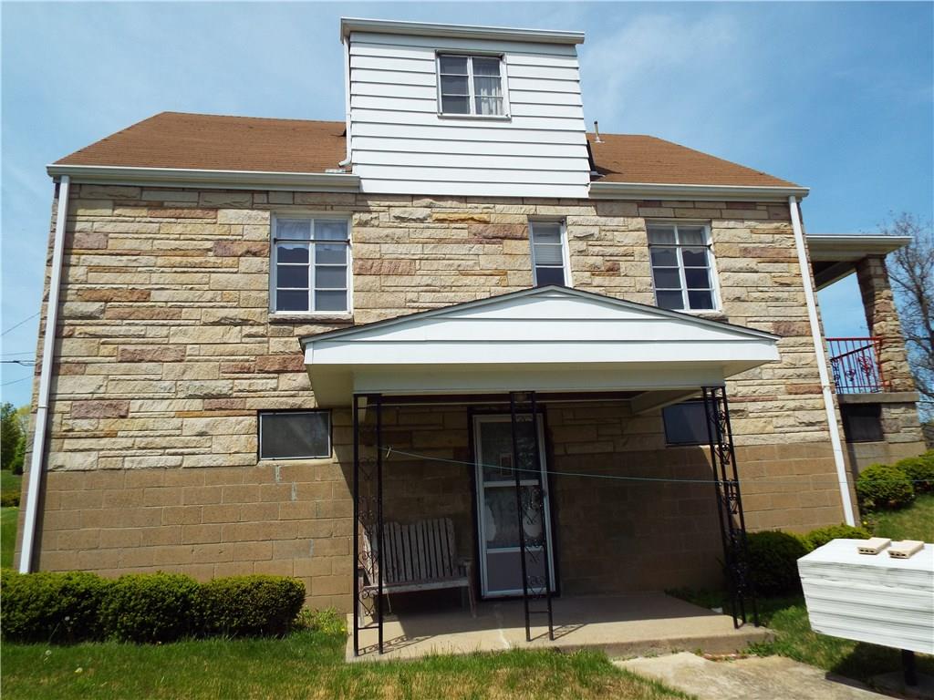 1900 Ridge Avenue Coraopolis, PA 15108 - Photo 4 of 24 Rear of home features covered private patio and gas line for a gas grill.