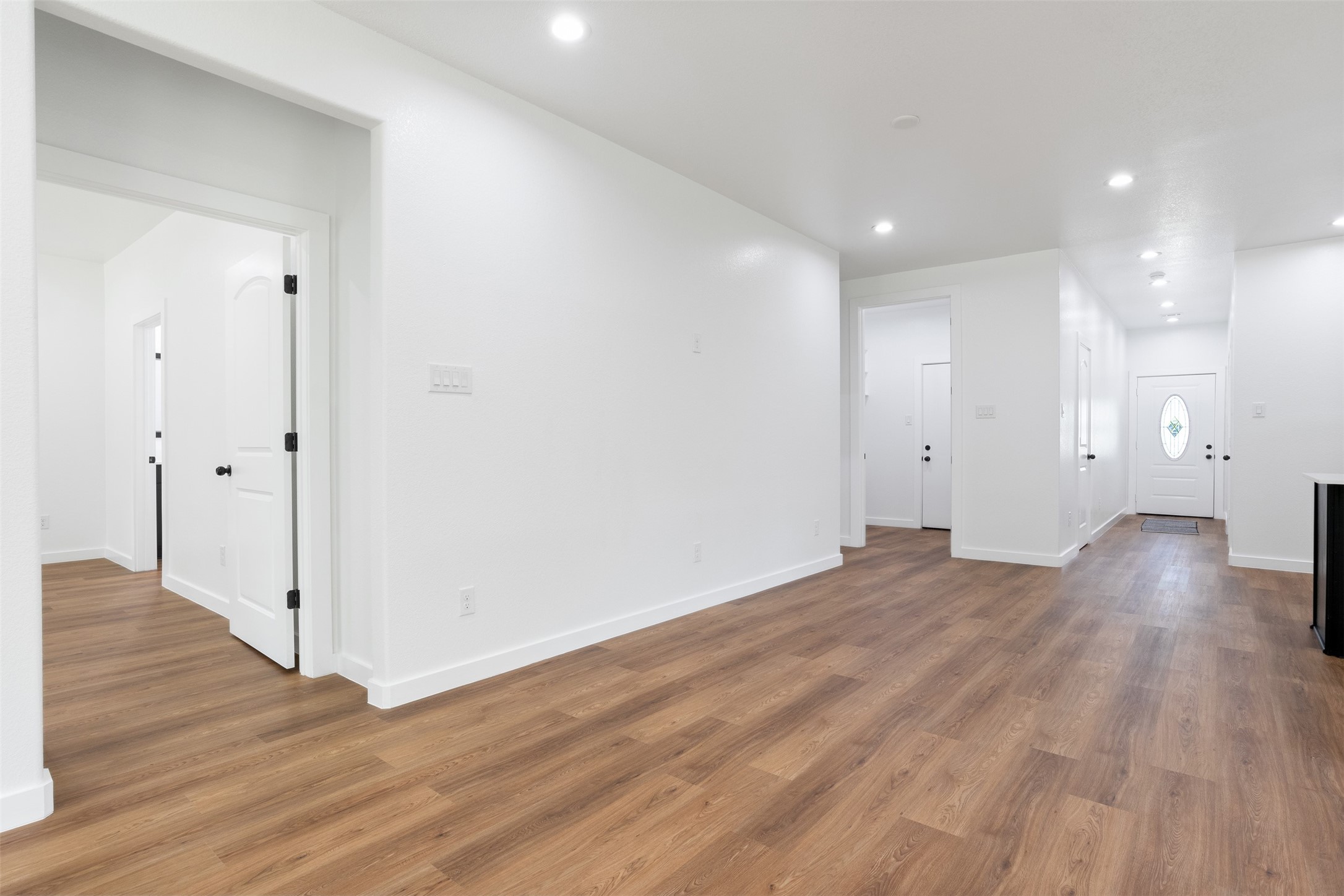 14390 Half Circle Splendora, TX 77372 - Photo 11 of 27 a view of empty room with wooden floor