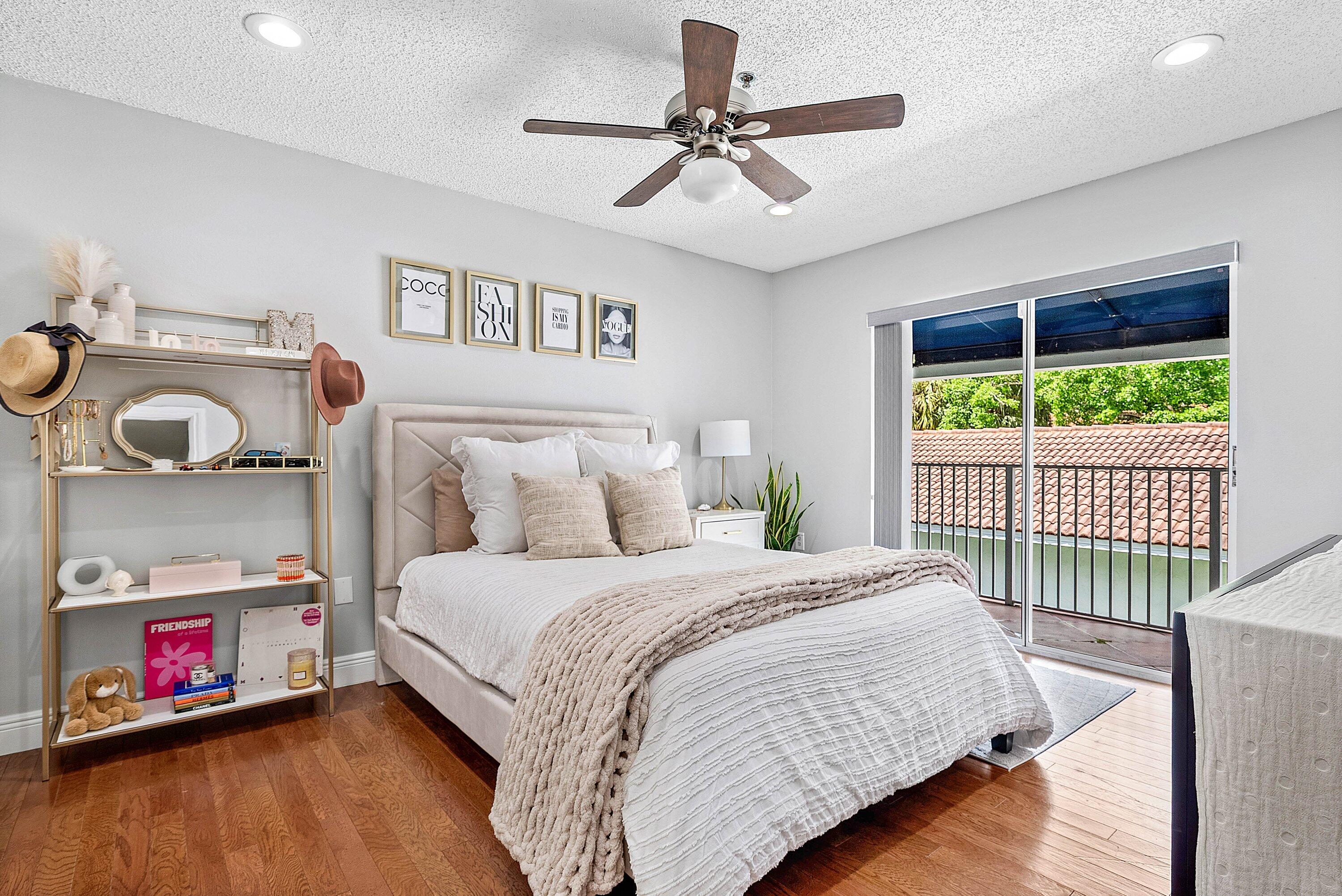 Undisclosed Address Boca Raton, FL 33496 - Photo 15 of 46 a bedroom with a bed and a window