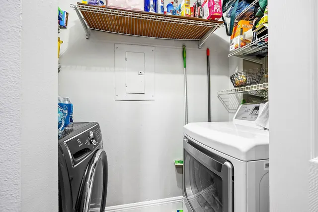 a utility room with dryer and washer