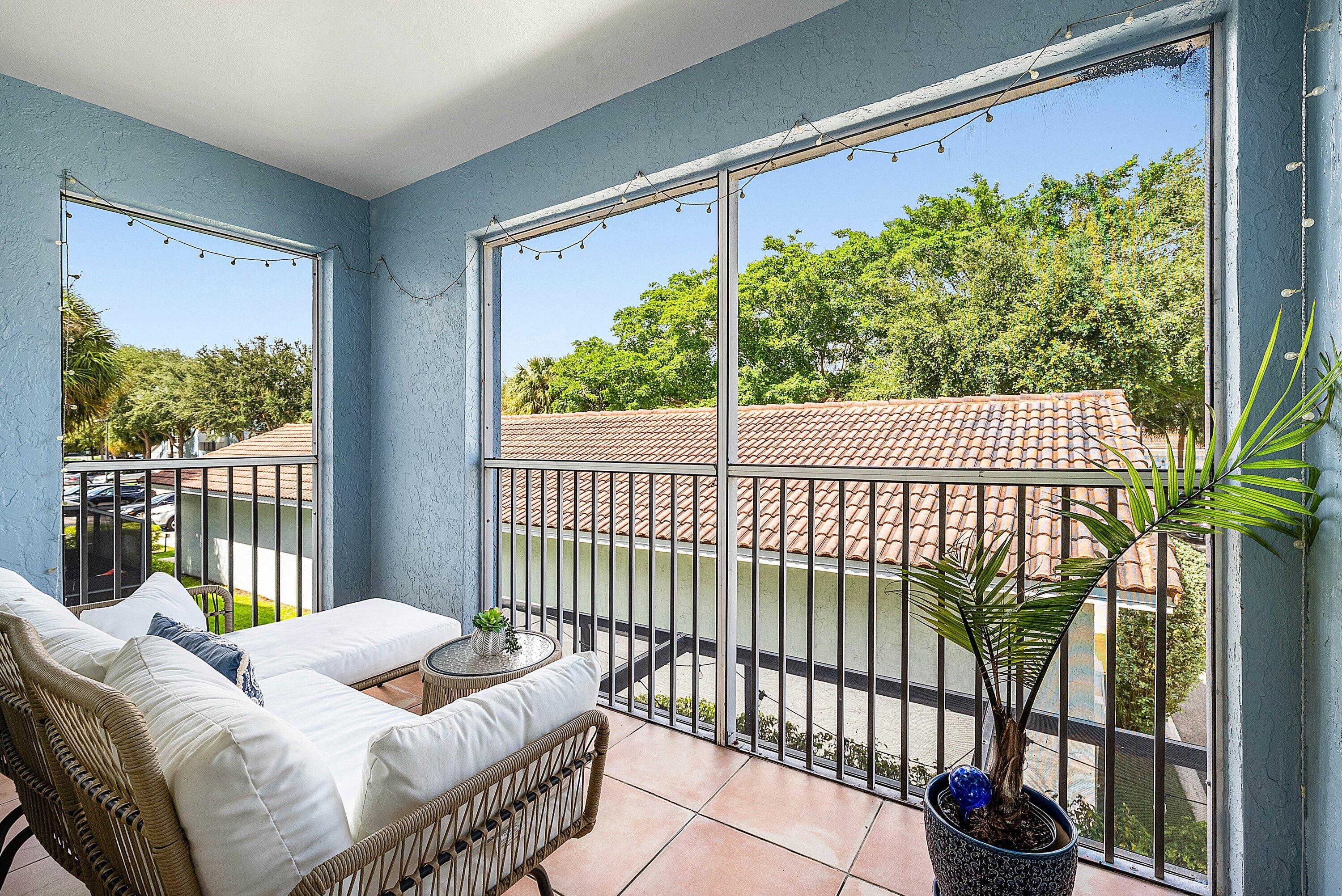 Undisclosed Address Boca Raton, FL 33496 - Photo 29 of 46 a balcony view with a garden space