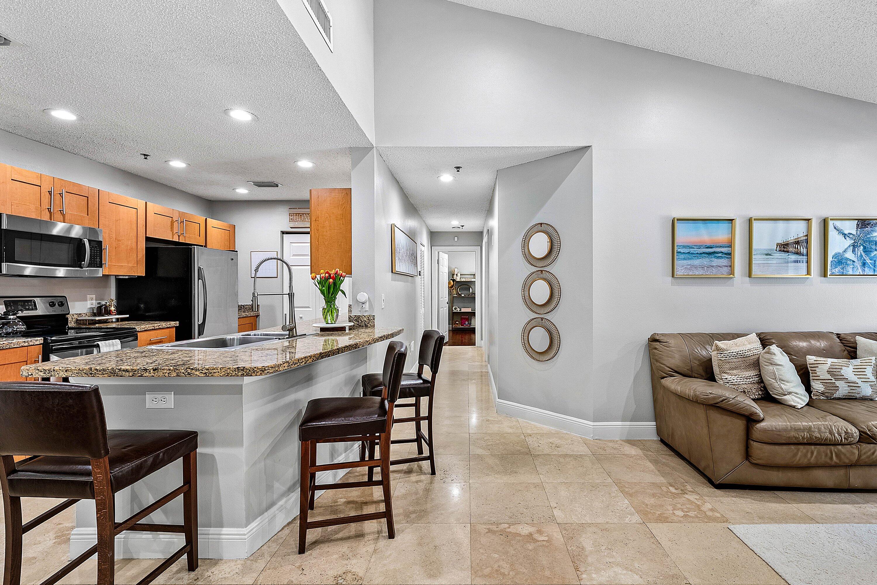 Undisclosed Address Boca Raton, FL 33496 - Photo 3 of 46 a living room with furniture and a flat screen tv