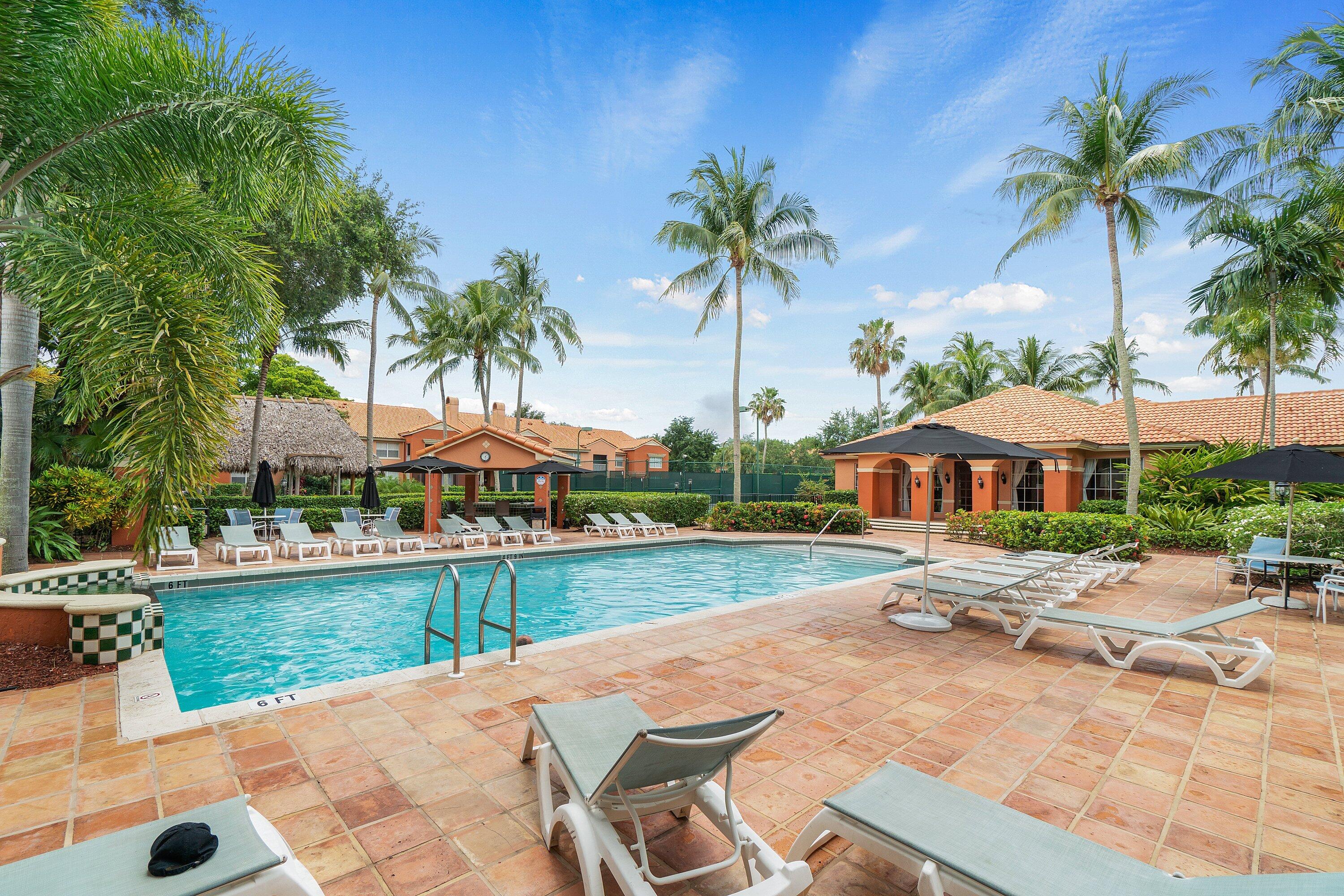 Undisclosed Address Boca Raton, FL 33496 - Photo 32 of 46 a view of a house with garden and a patio