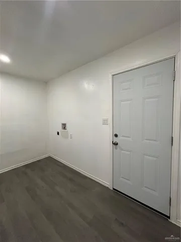 an empty room with an entryway