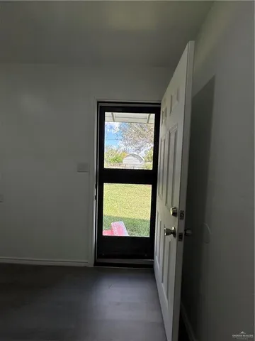 a view of room with a large window