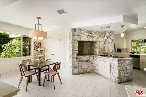 a view of a dining room kitchen and a window