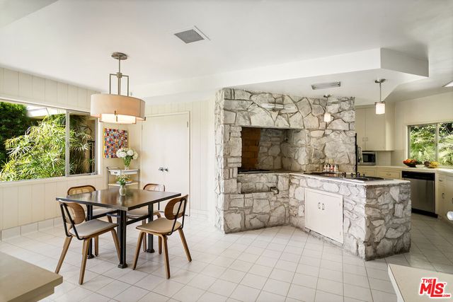 a view of a dining room kitchen and a window