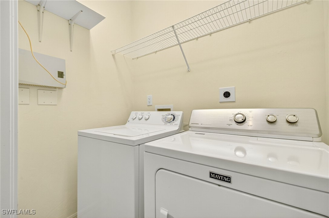 2797 First Street, Unit 2004 Fort Myers, FL 33916 - Photo 20 of 41 a utility room with dryer and washer