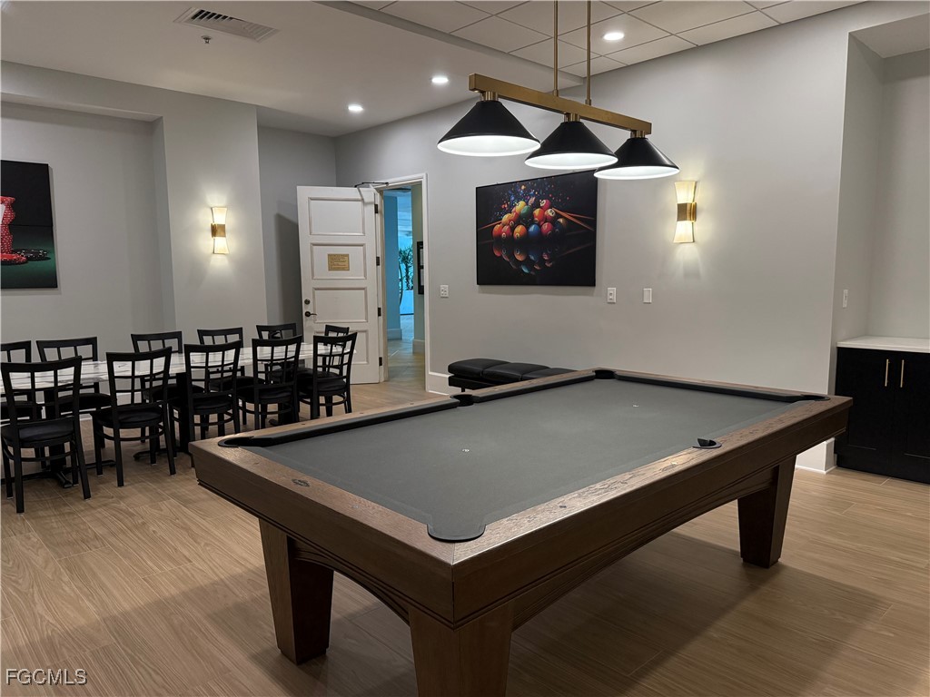 2797 First Street, Unit 2004 Fort Myers, FL 33916 - Photo 35 of 41 a room with pool table and windows