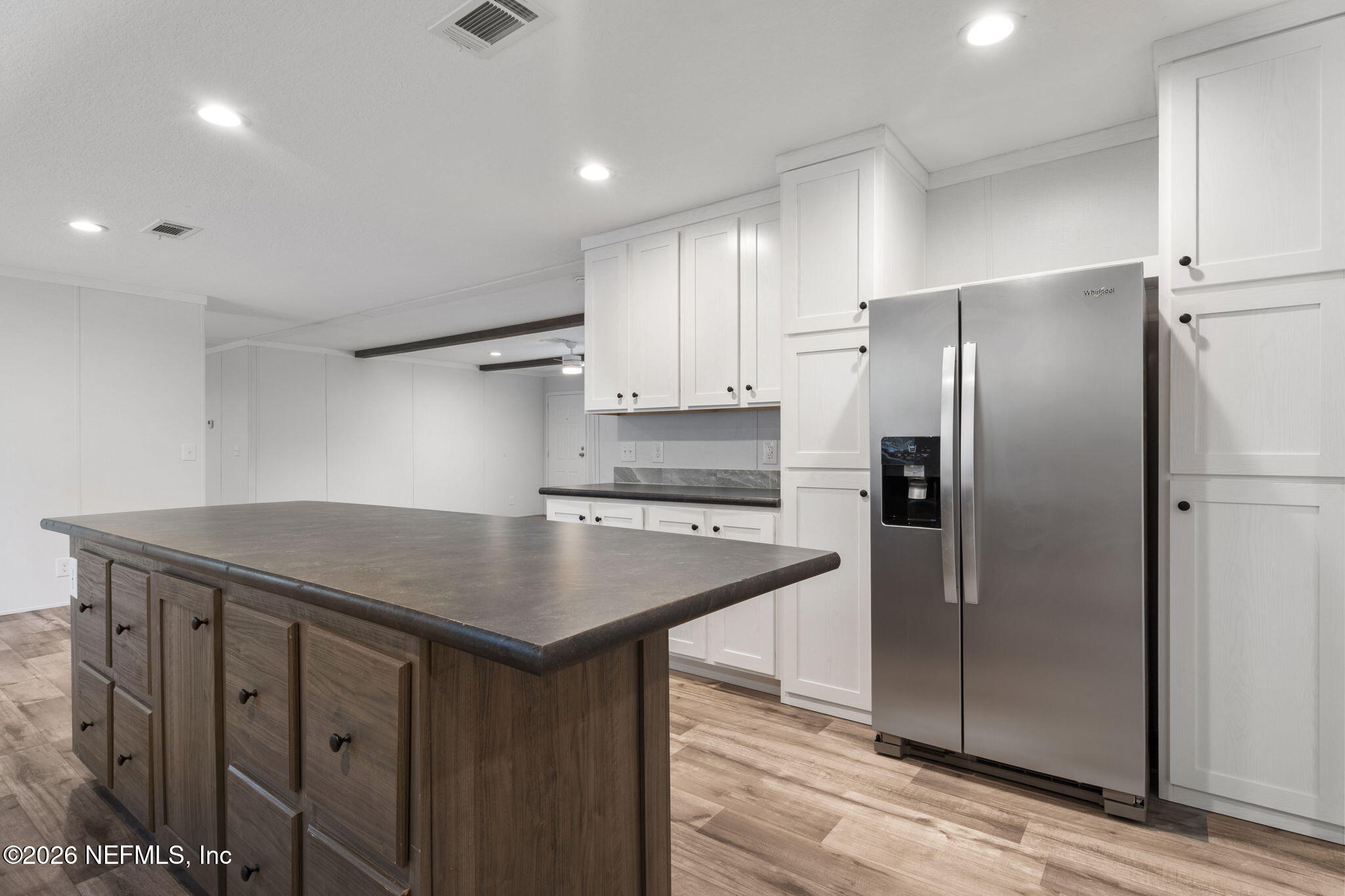 110 Slipper Way Hawthorne, FL 32640 - Photo 14 of 42 a kitchen with stainless steel appliances granite countertop a refrigerator a sink and a refrigerator