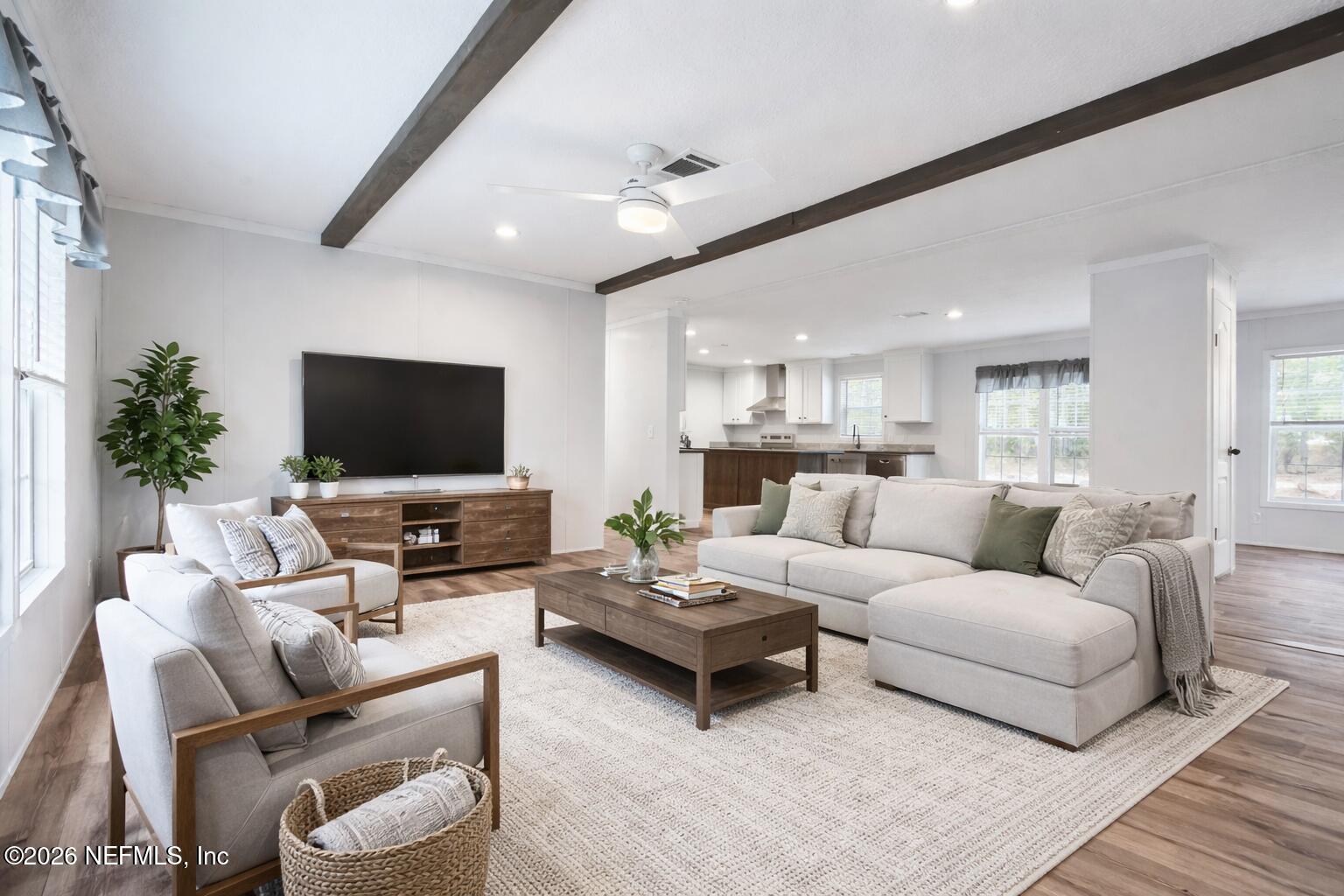 110 Slipper Way Hawthorne, FL 32640 - Photo 2 of 42 a living room with furniture and a flat screen tv