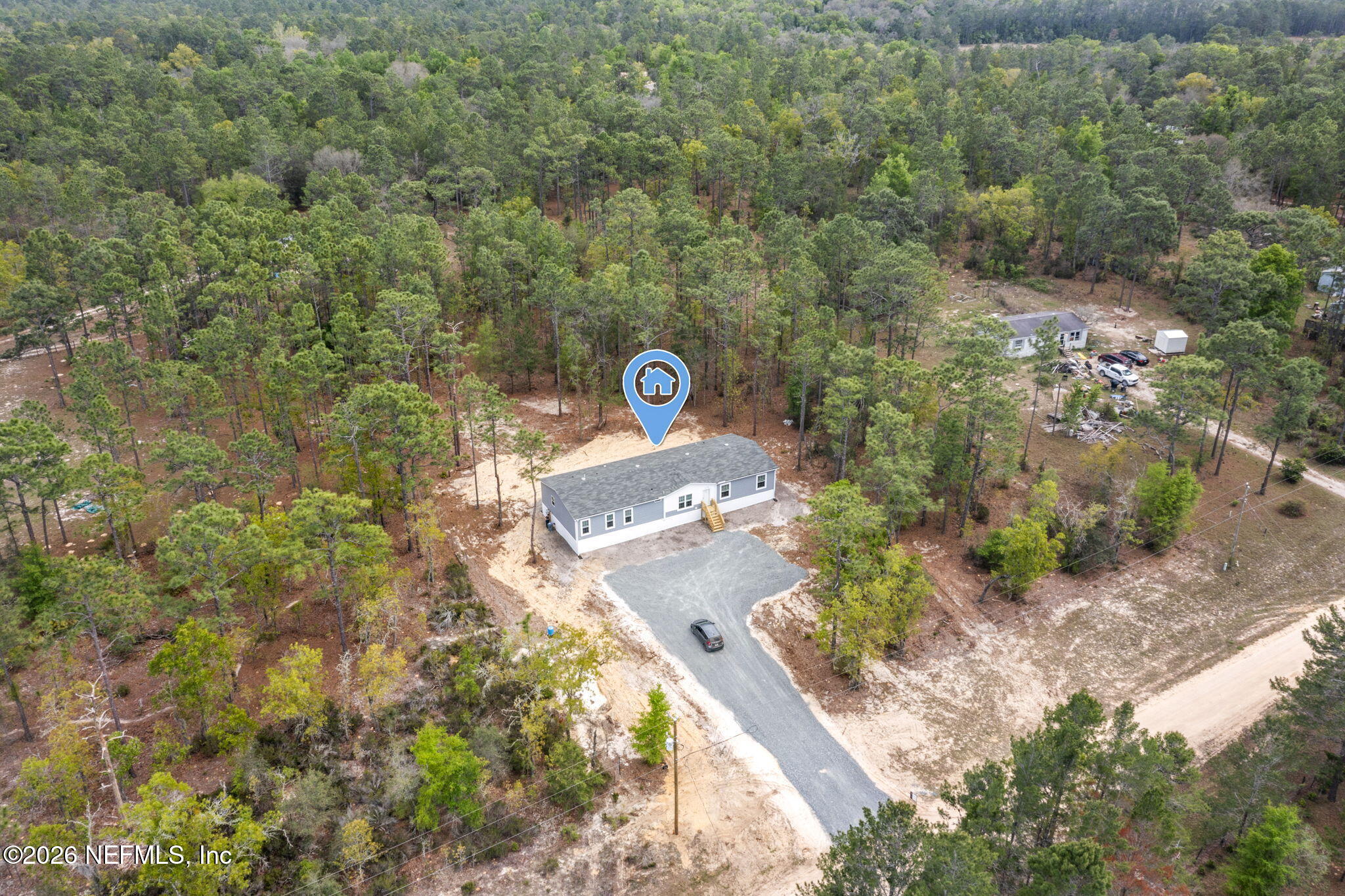 110 Slipper Way Hawthorne, FL 32640 - Photo 30 of 42 a view of a back yard of the house