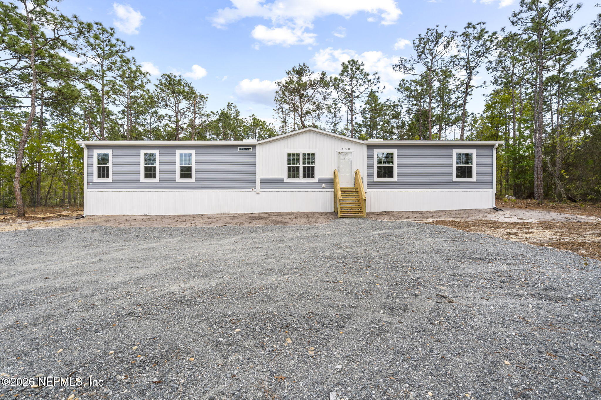 110 Slipper Way Hawthorne, FL 32640 - Photo 32 of 42 a house that has a tree in front of it