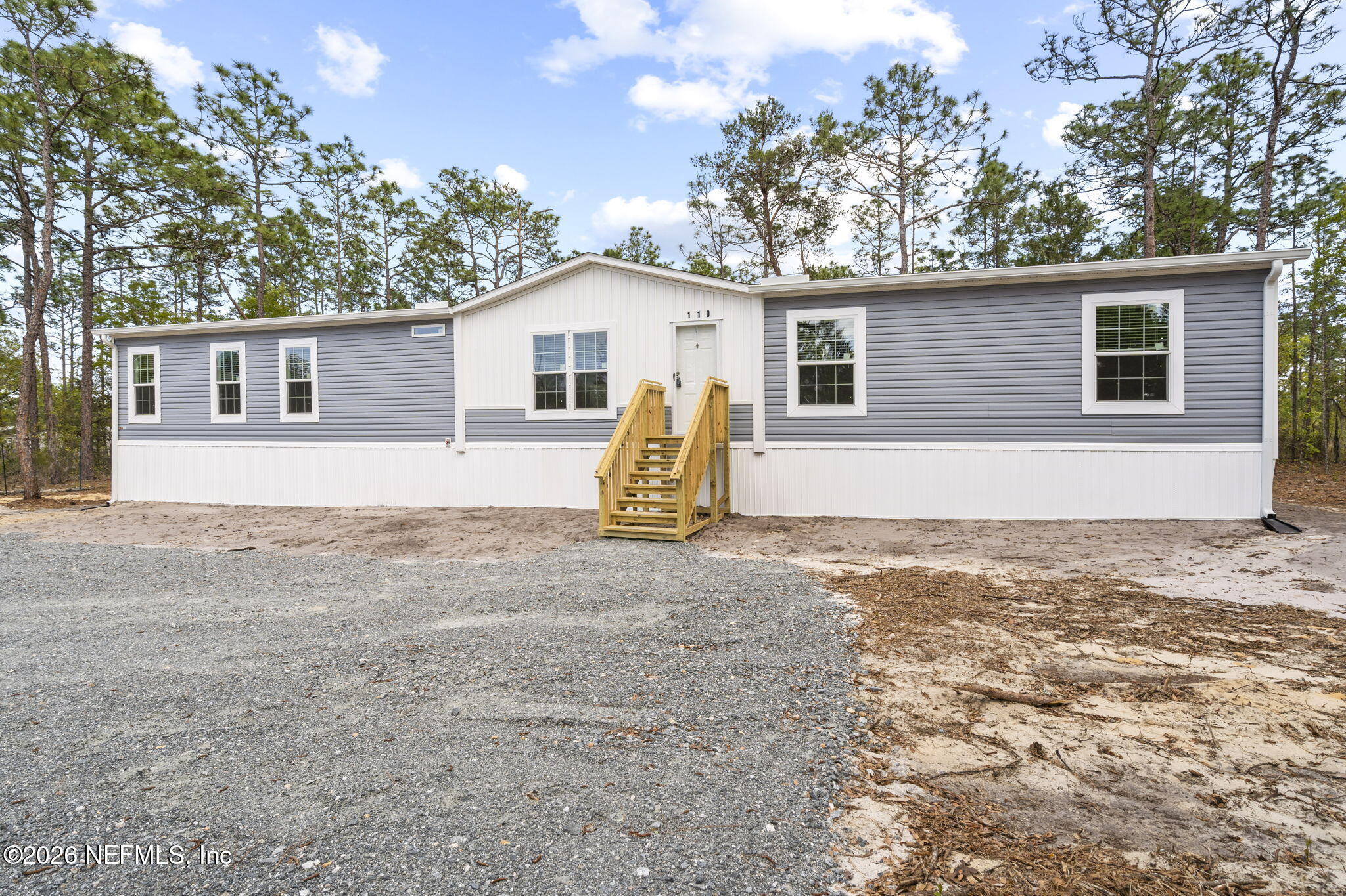 110 Slipper Way Hawthorne, FL 32640 - Photo 33 of 42 front view of house with a yard