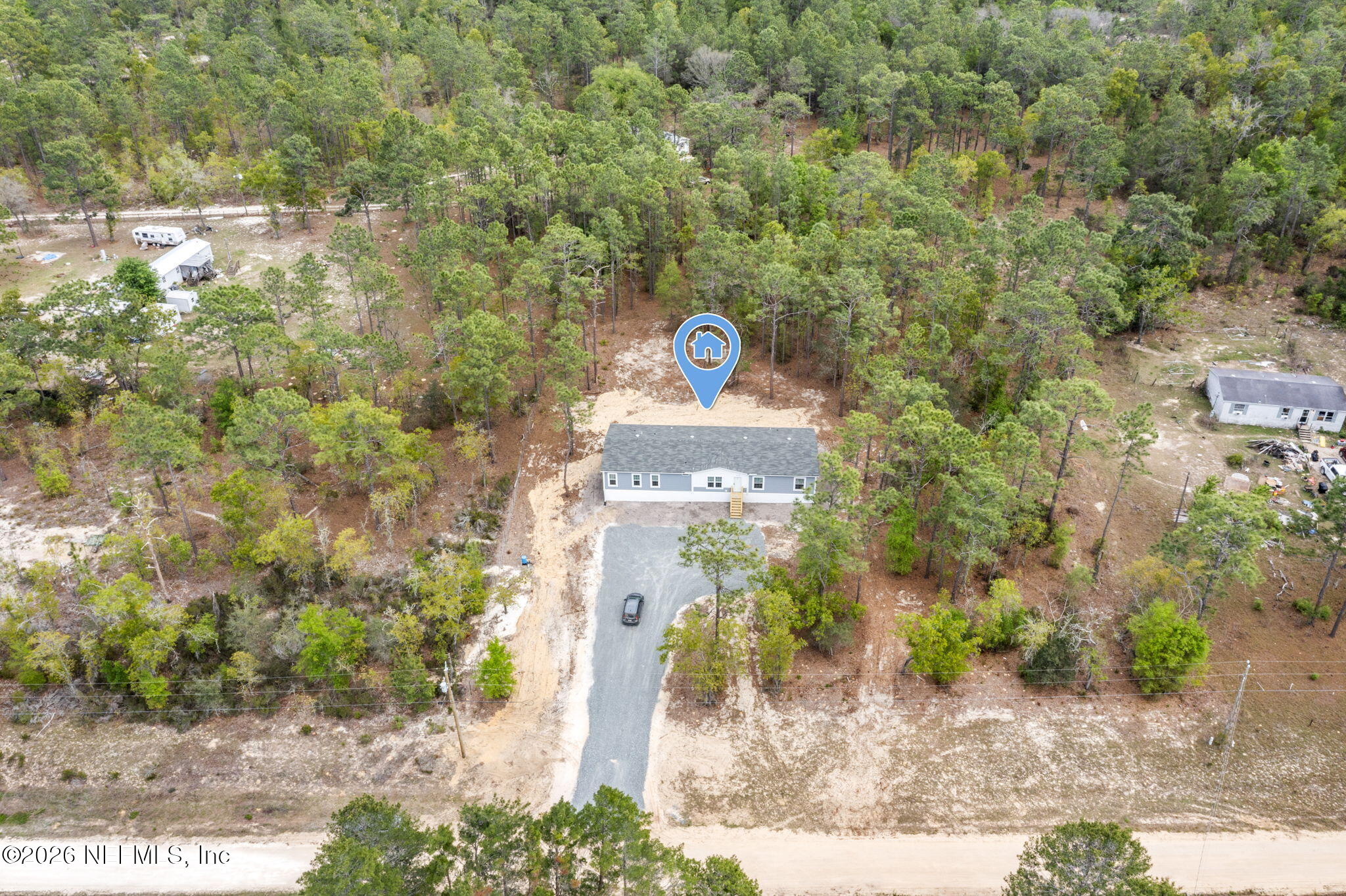 110 Slipper Way Hawthorne, FL 32640 - Photo 34 of 42 a front view of a house with a yard