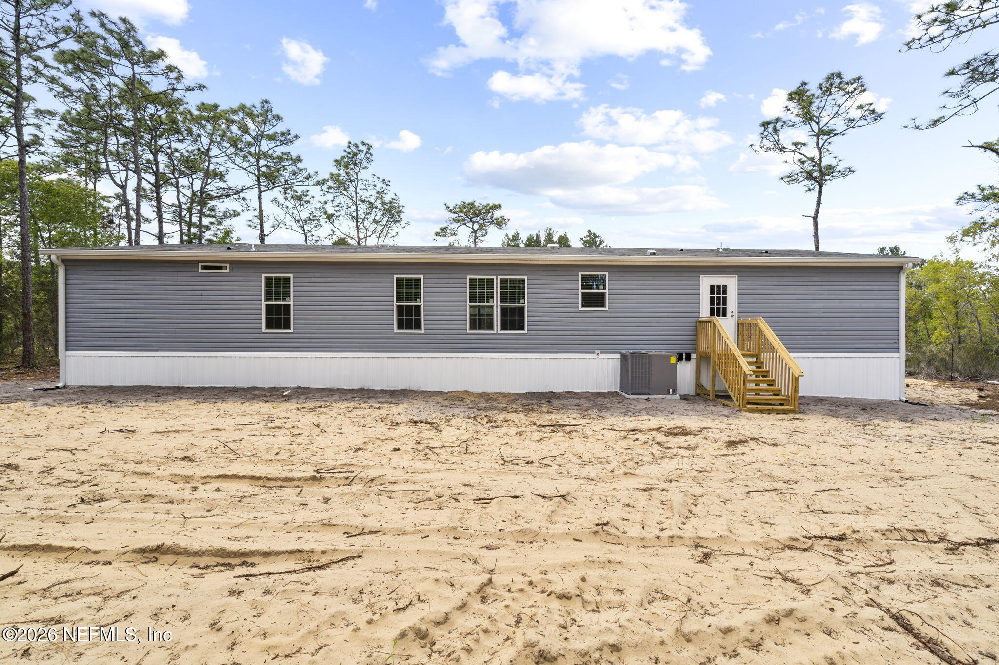 110 Slipper Way Hawthorne, FL 32640 - Photo 40 of 42 a view of a backyard of the house