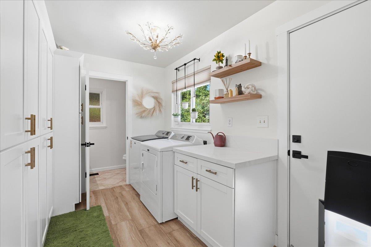 4849 Alexon Way Carmichael, CA 95608 - Photo 20 of 50 a spacious bathroom with a double vanity sink a mirror and a shower