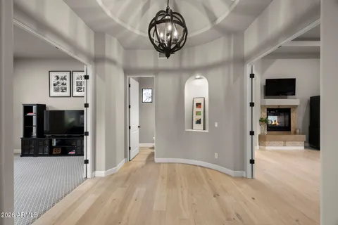a view of a livingroom with a kitchen
