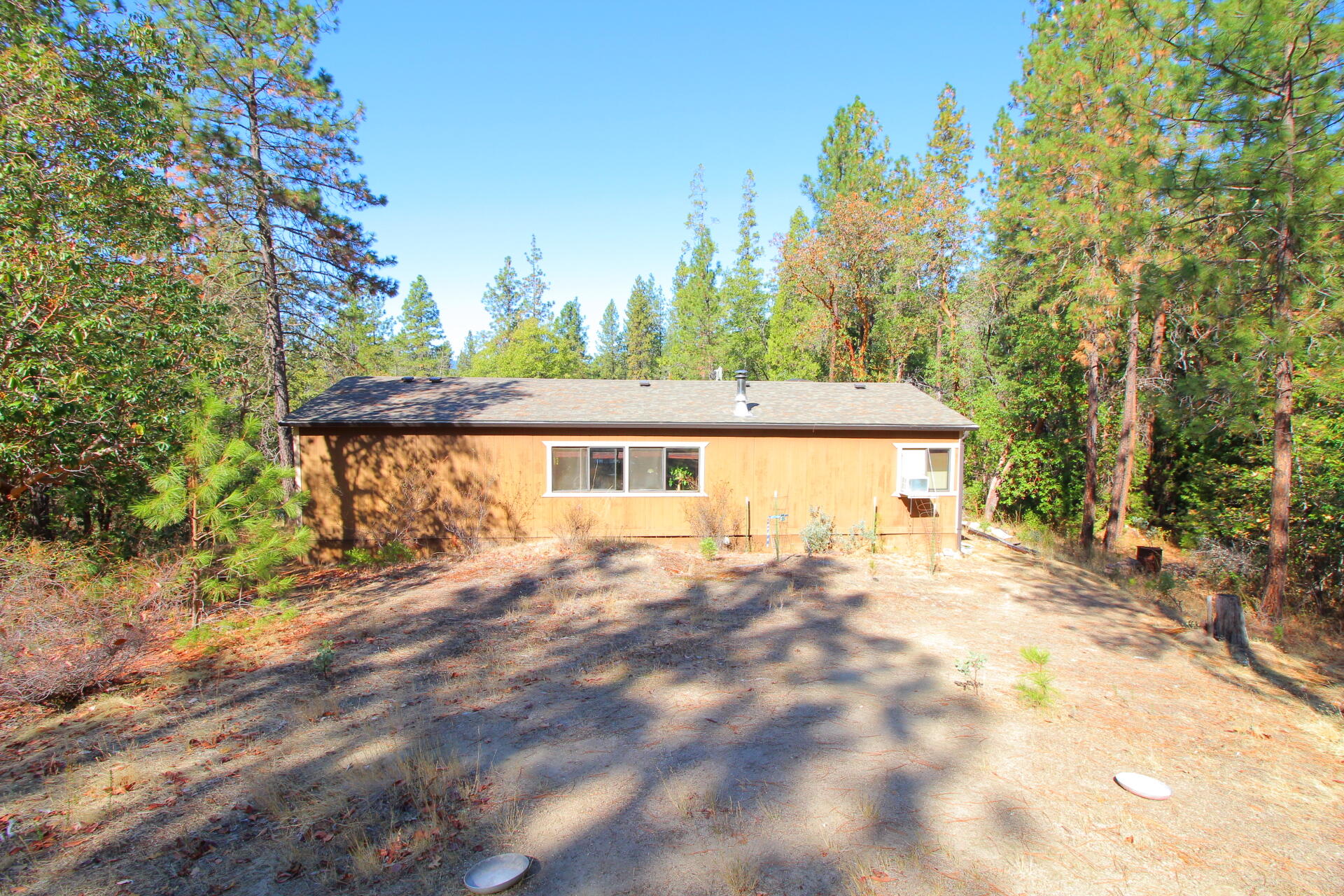 10489 Lower River Road Grants Pass, OR 97526 - Photo 12 of 30 back of home flat spacious