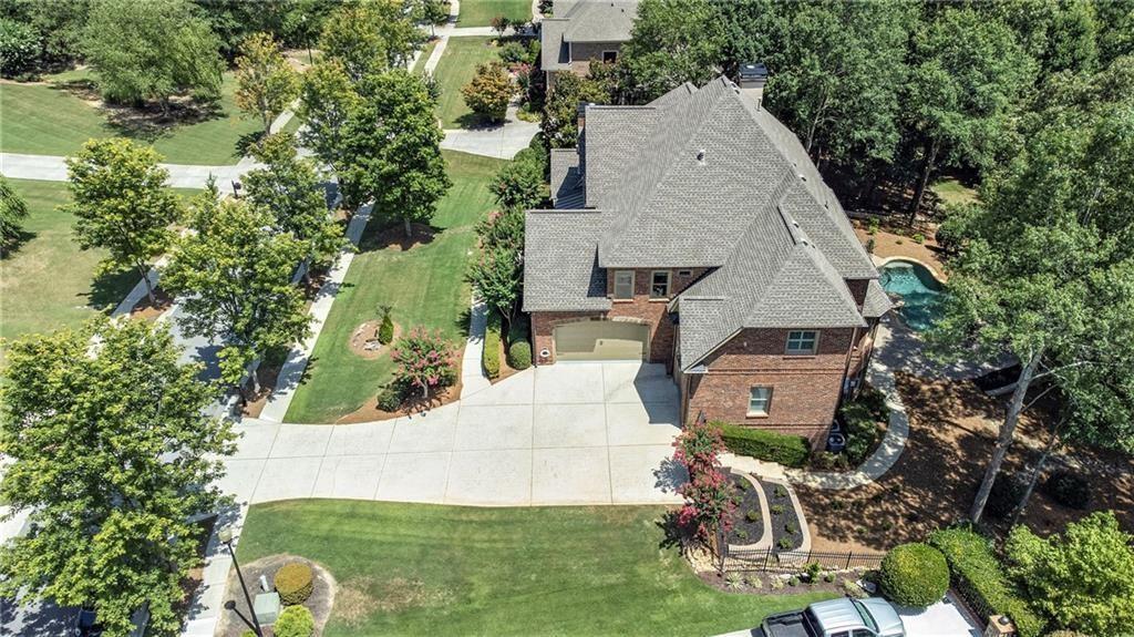 2317 Crimson King Drive Braselton, GA 30517 - Photo 41 of 66 an aerial view of a house with yard