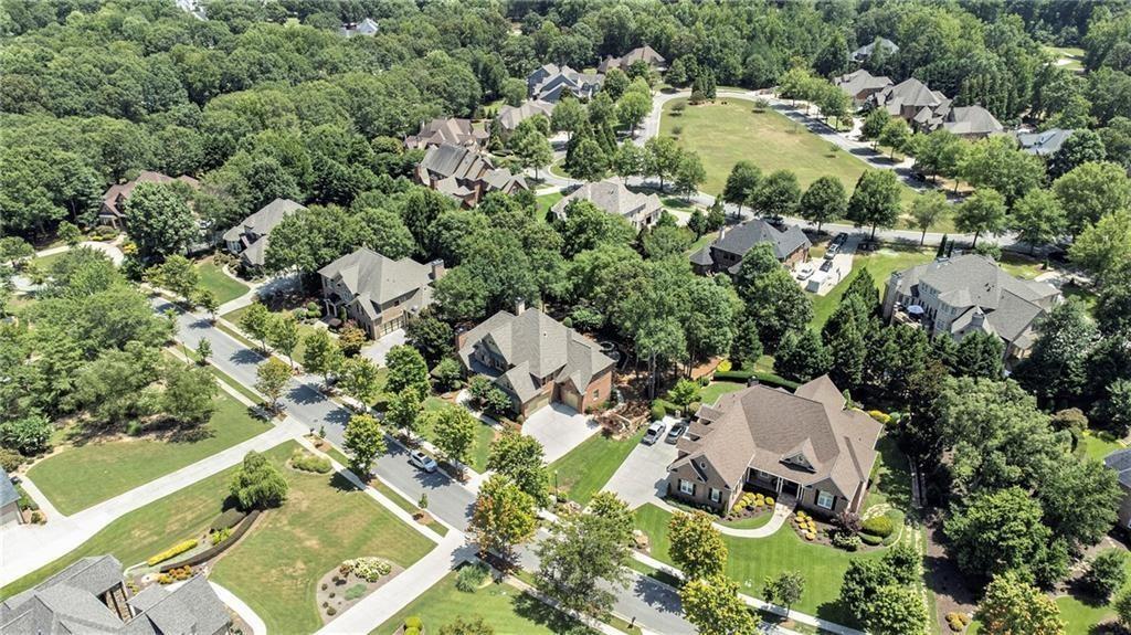 2317 Crimson King Drive Braselton, GA 30517 - Photo 43 of 66 an aerial view of residential houses with outdoor space and trees
